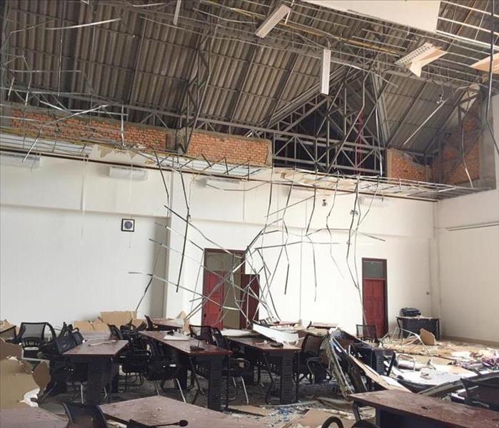 Damage to the roof and ceiling of an office following a violent storm in Vientiane, Laos.